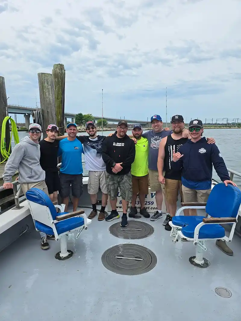 MC Electrical team bonding on boat