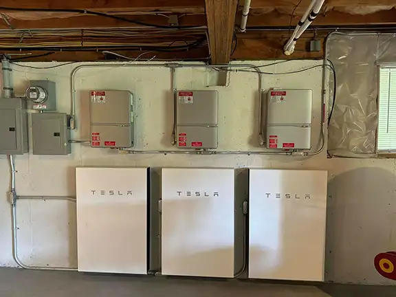 Solar system with three Tesla Powerwall battery units installed