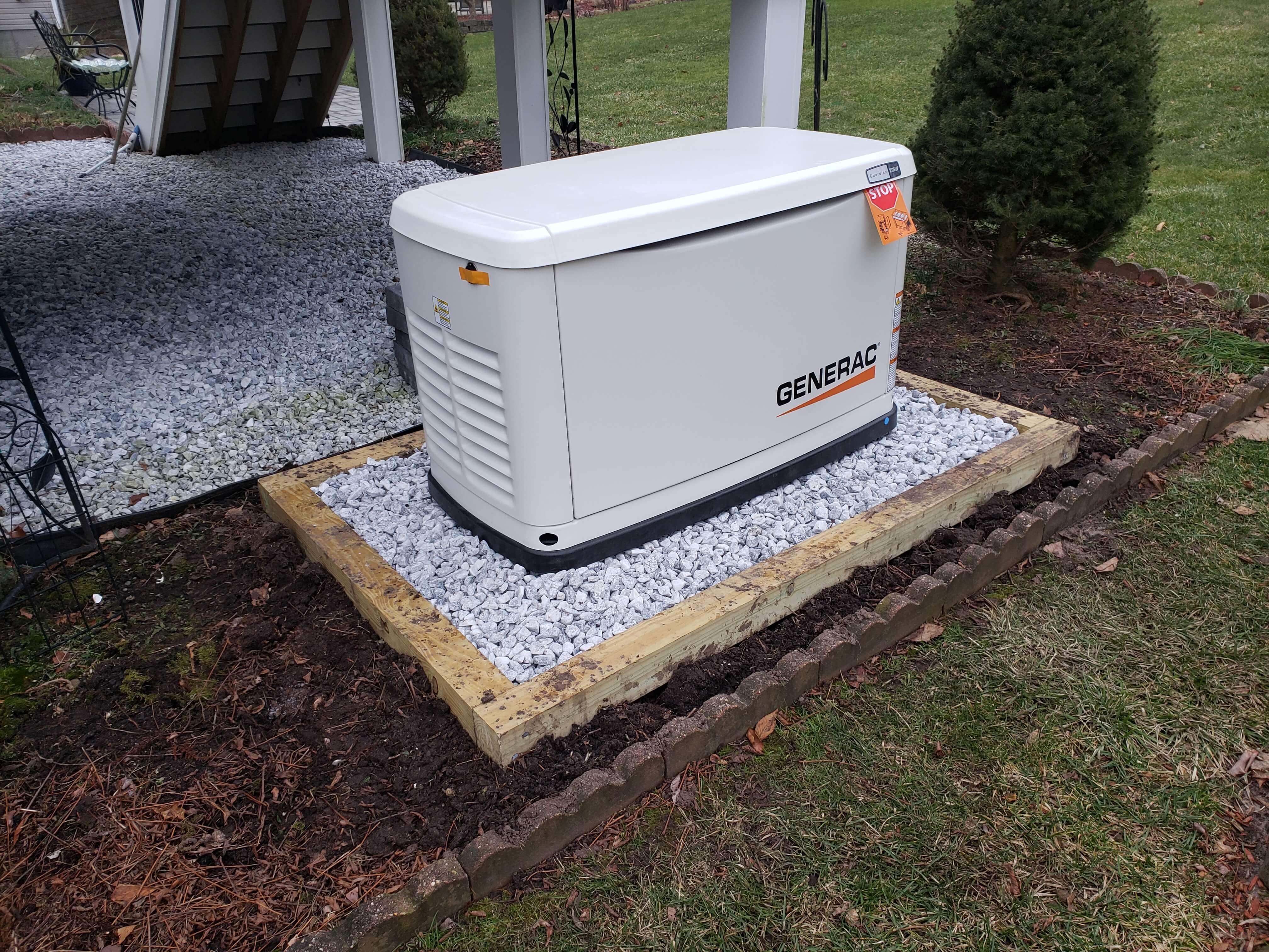 Large Generac near porch