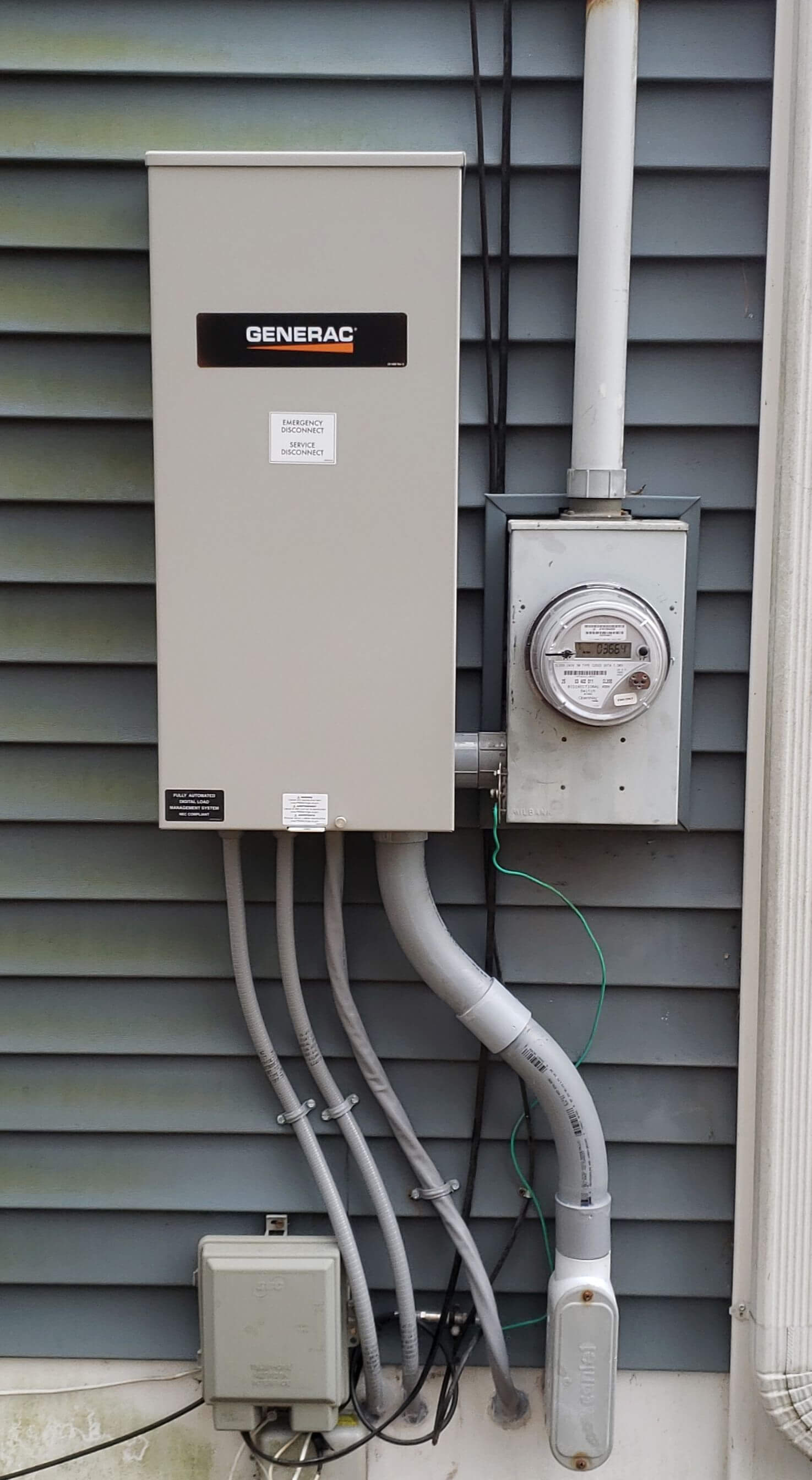 Generac automatic transfer switch mounted on exterior