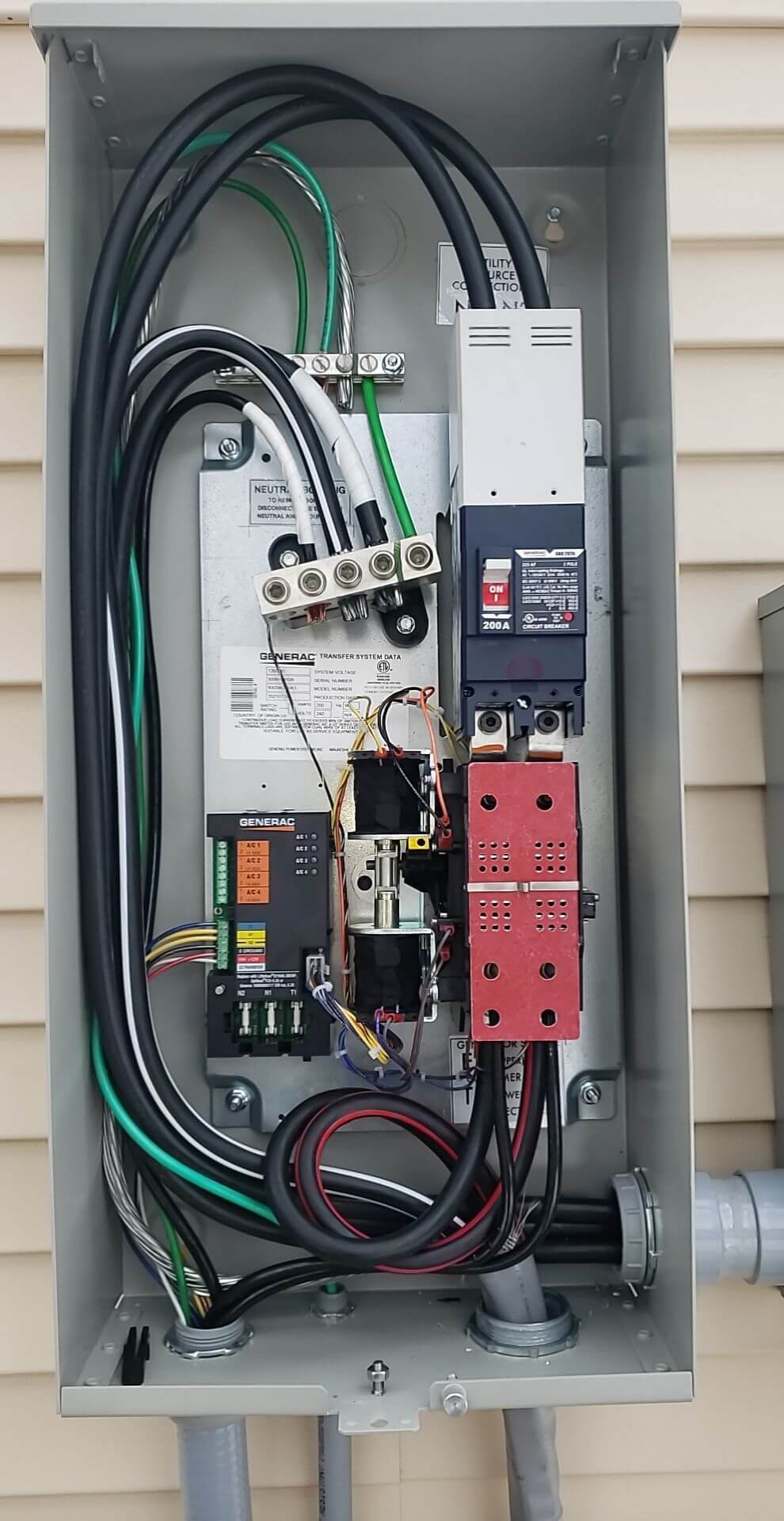 Generac transfer switch interior with 200A breaker