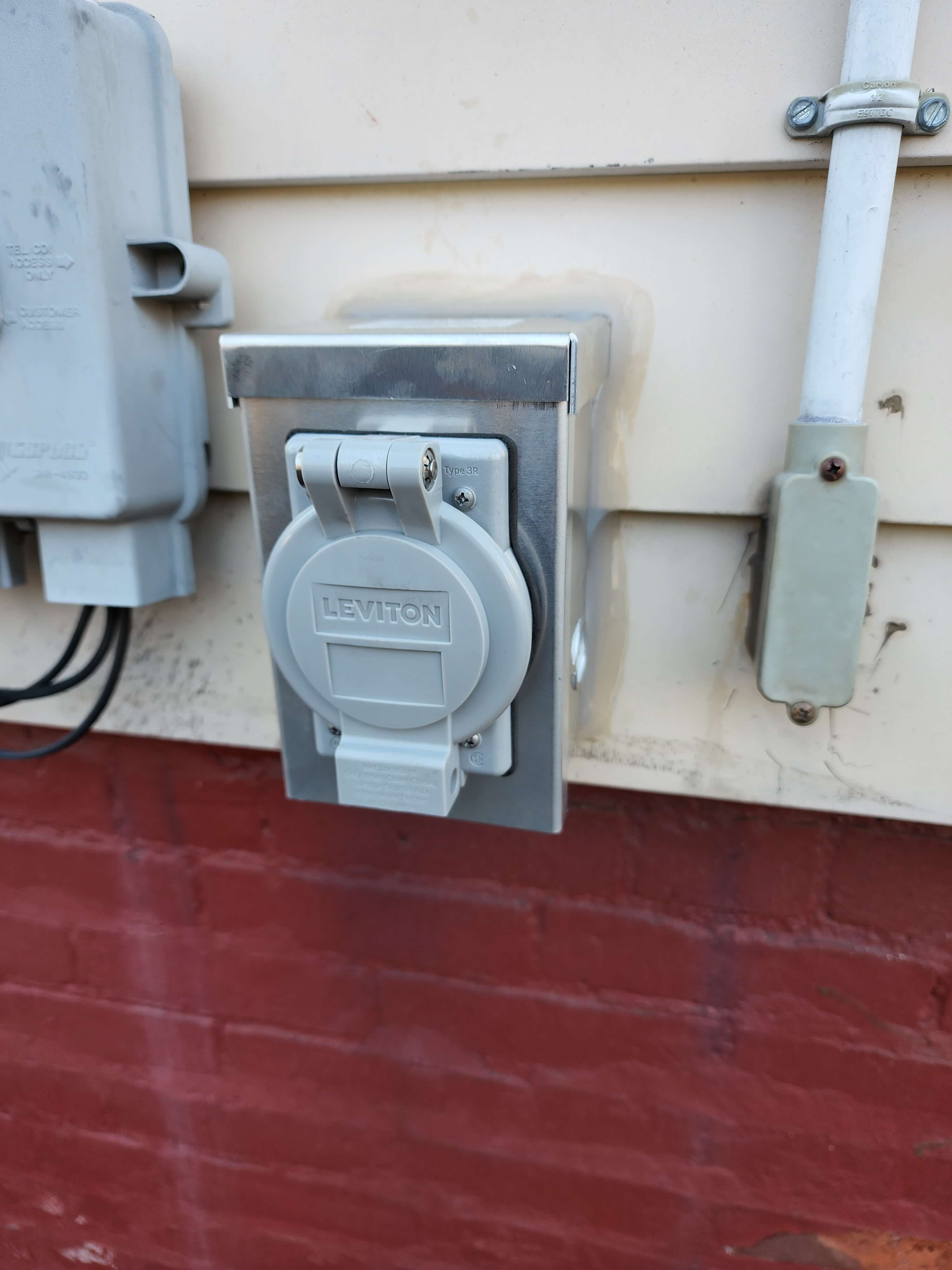 Leviton generator power inlet box on exterior wall