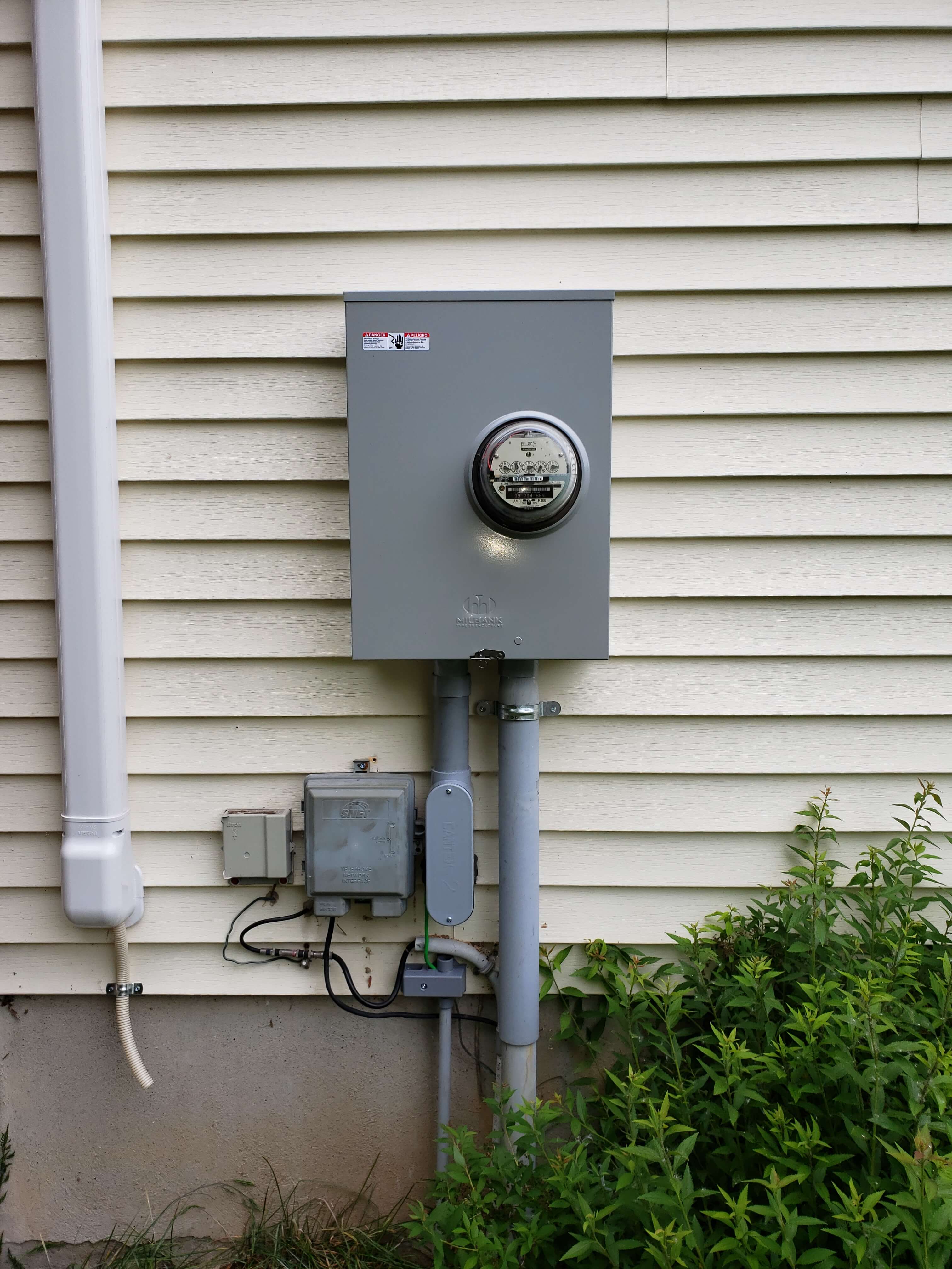 Milbank meter base and disconnect on exterior wall