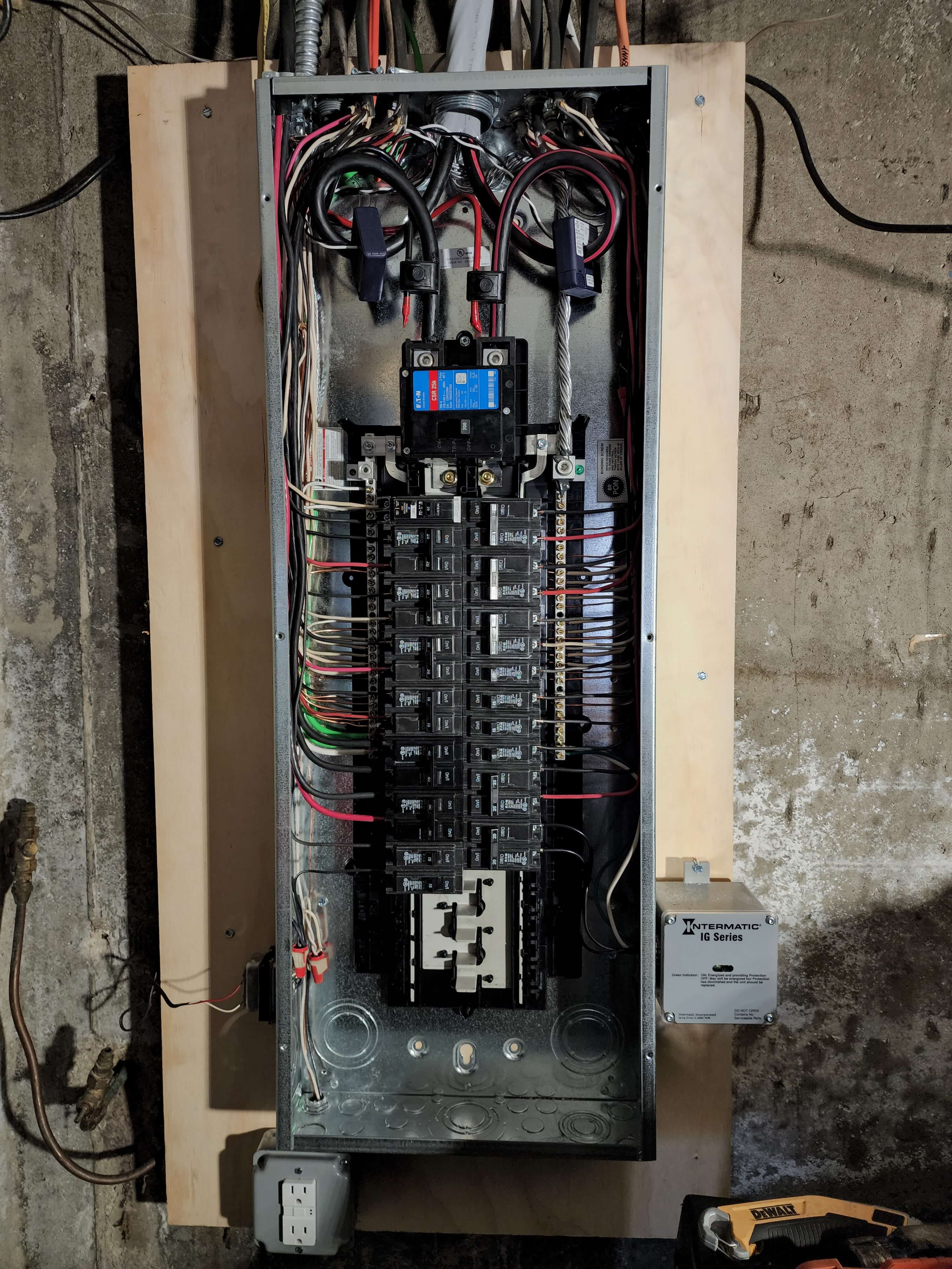 Inside view of upgraded electrical panel with organized wiring