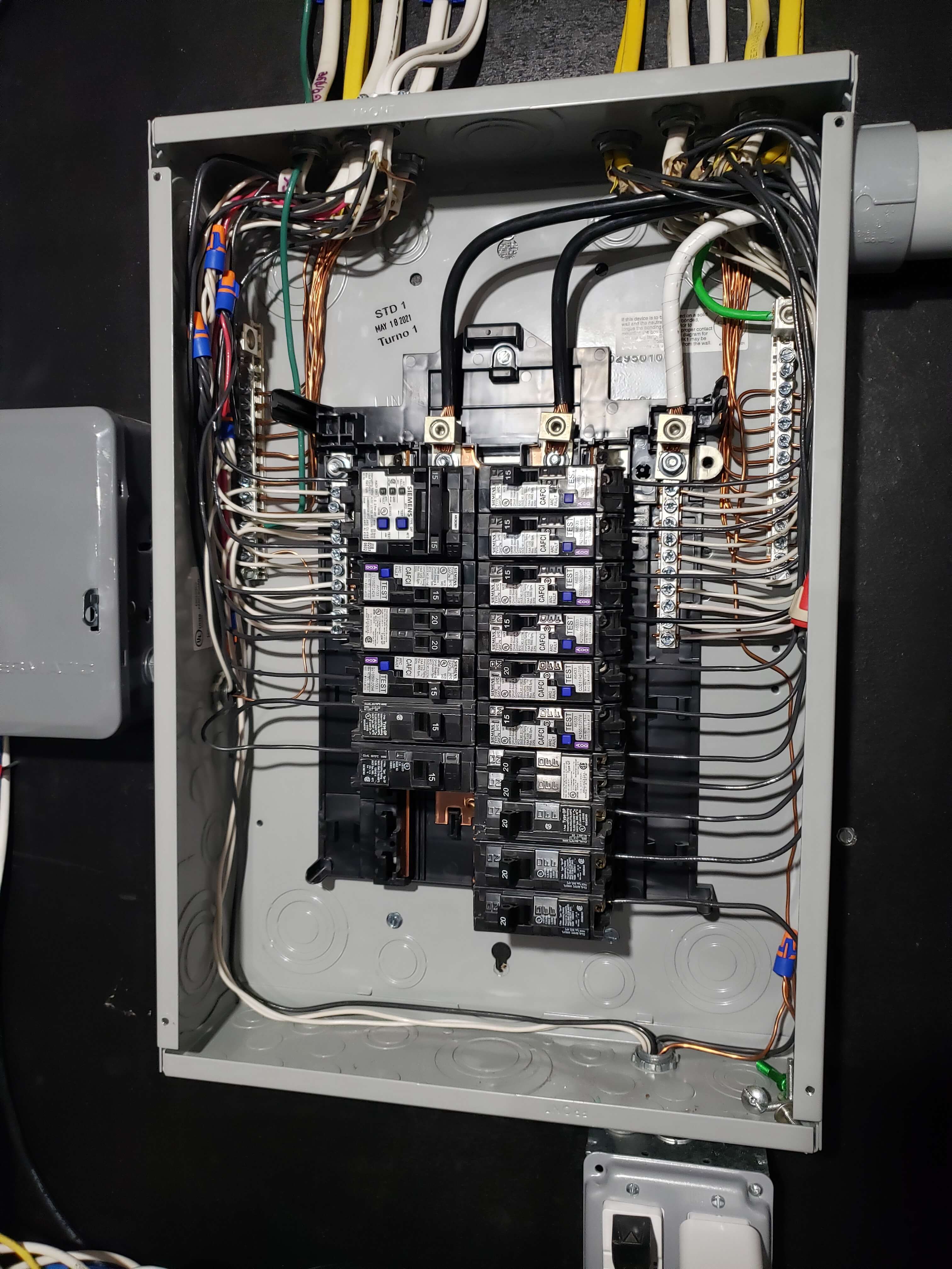 Siemens subpanel with AFCI/CAFCI breakers and organized wiring