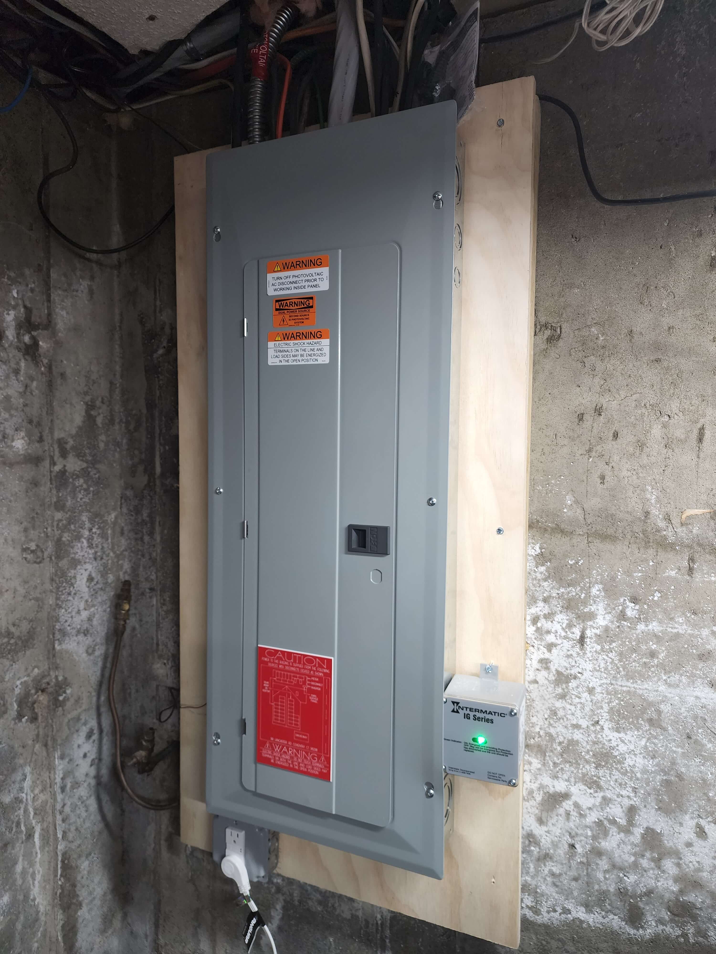 Electrical panel with solar integration and safety warnings