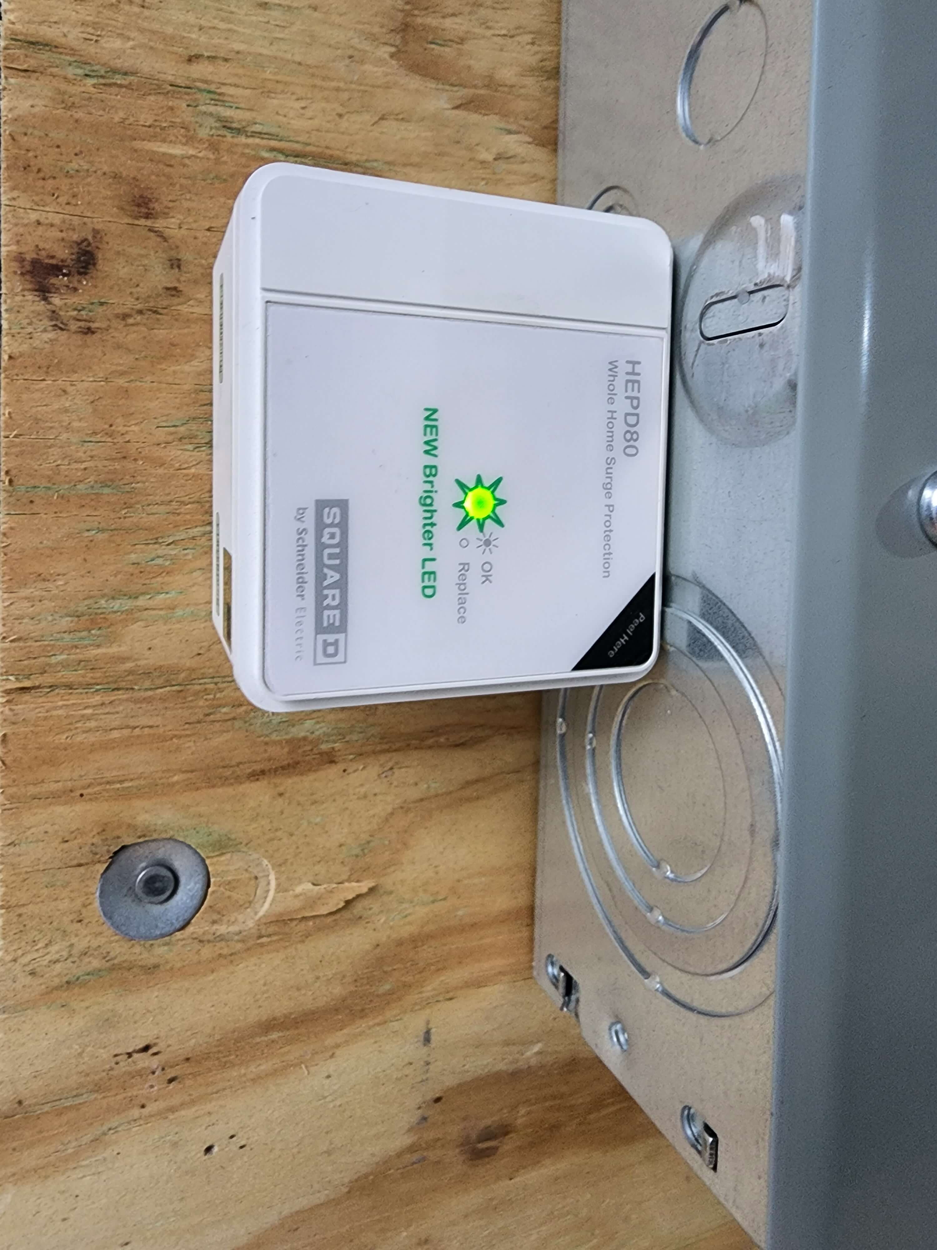 Square D HEPD80 whole home surge protector with green LED