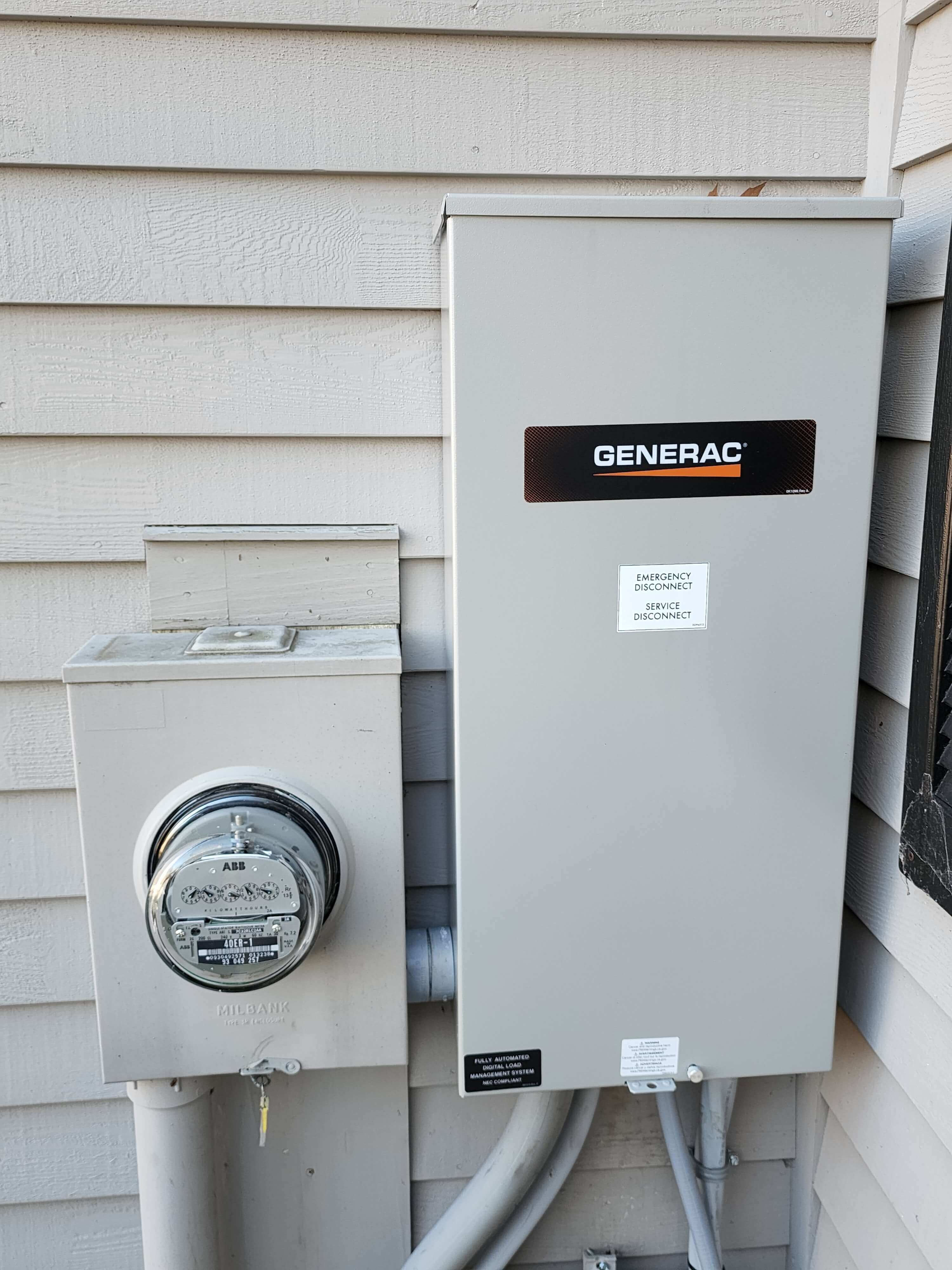 Generac transfer switch next to meter